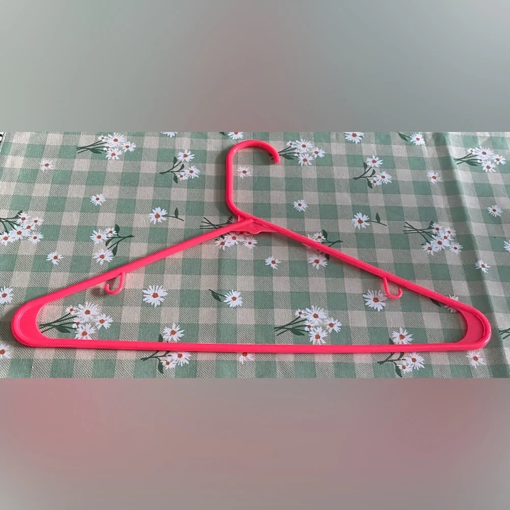 Bright Pink Plastic Clothing Hanger